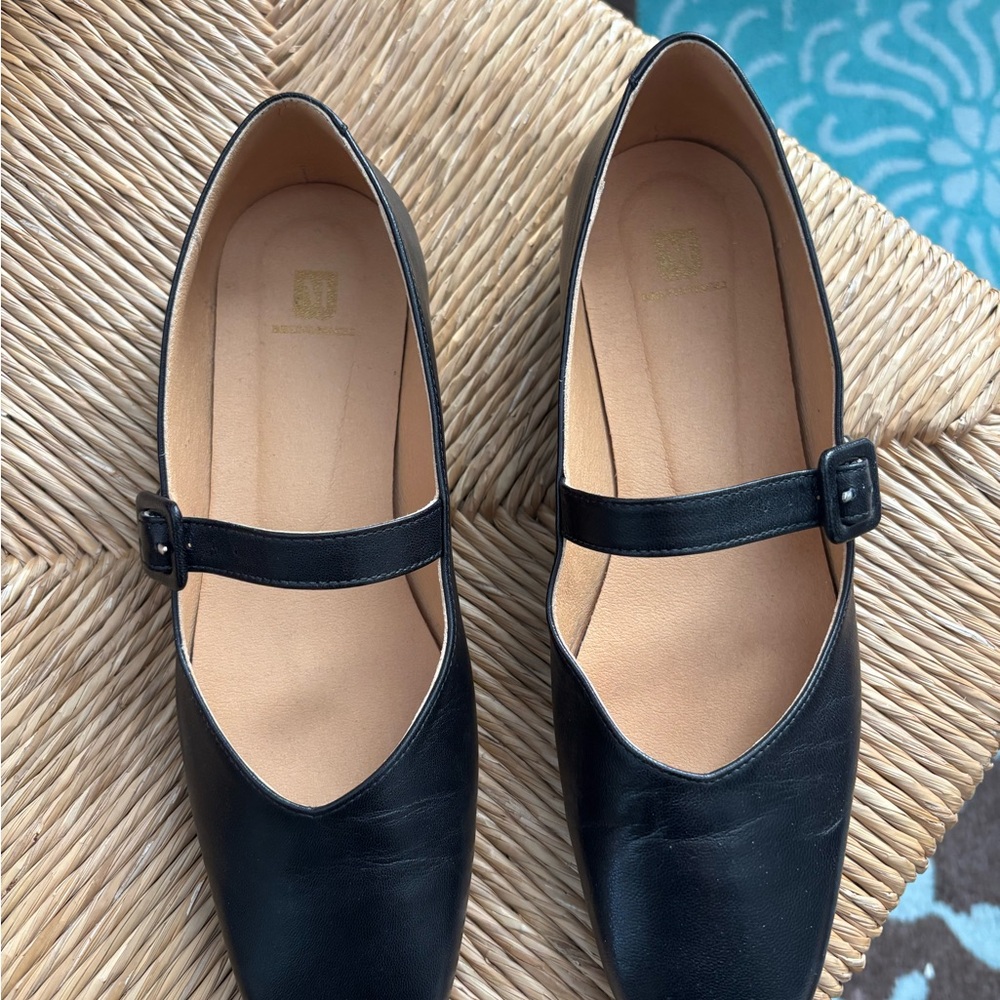 Bruno Magli Black Flats with Elegant Design